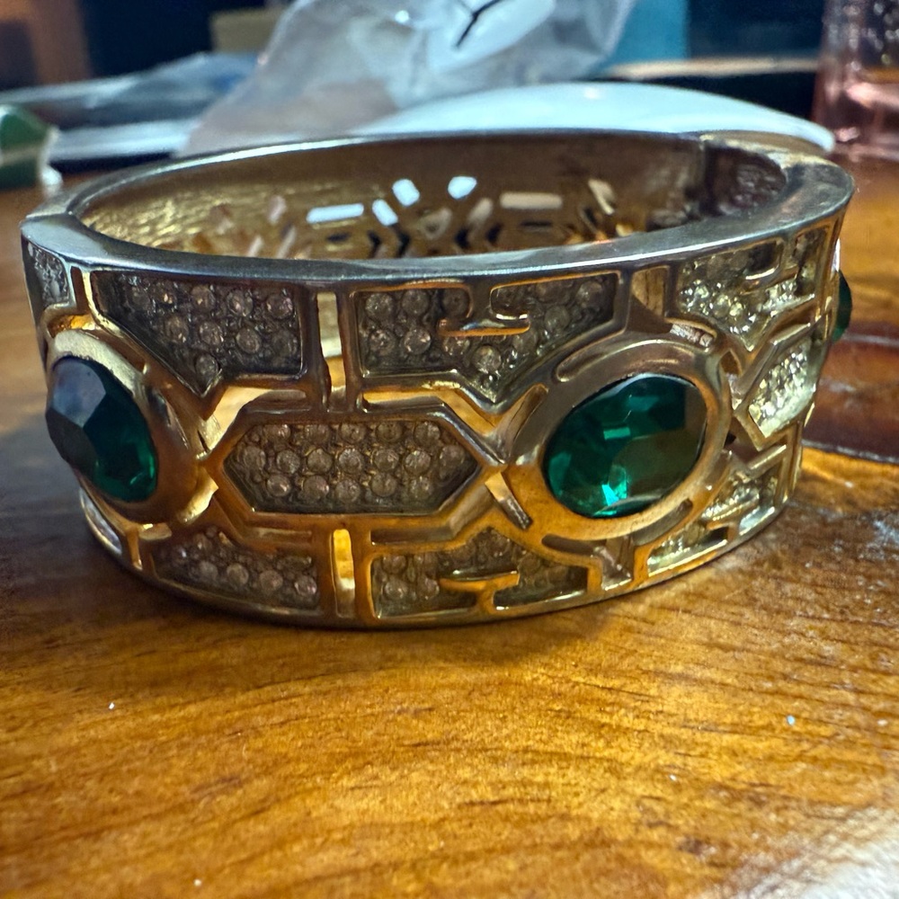 Gold and Green Ornate Bracelet with Emerald Accents